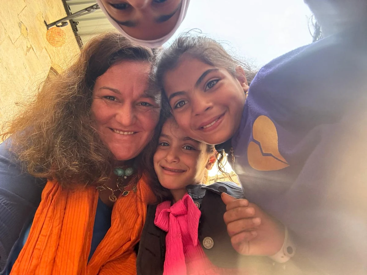Selfie of Soumaya Hallak with children.